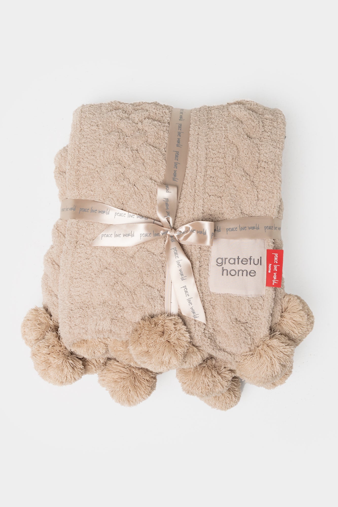 Pom Pom Cable Knit Blanket