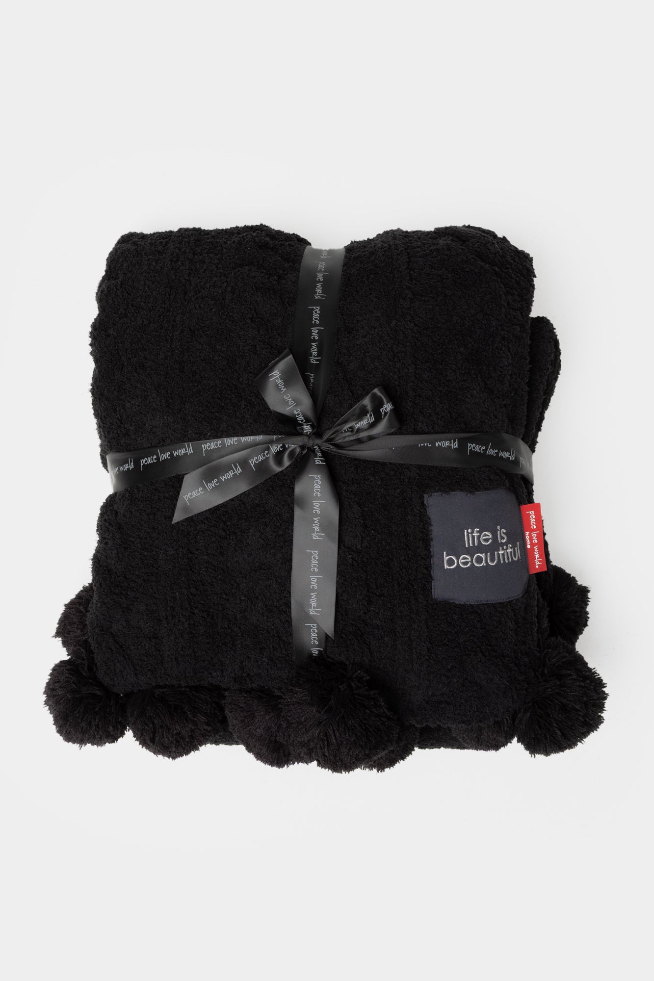 Pom Pom Cable Knit Blanket