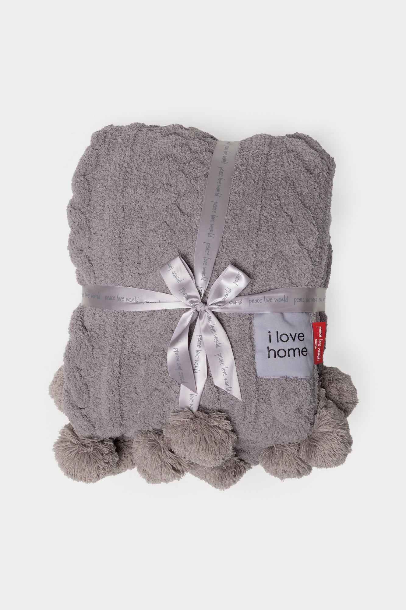 Pom Pom Cable Knit Blanket